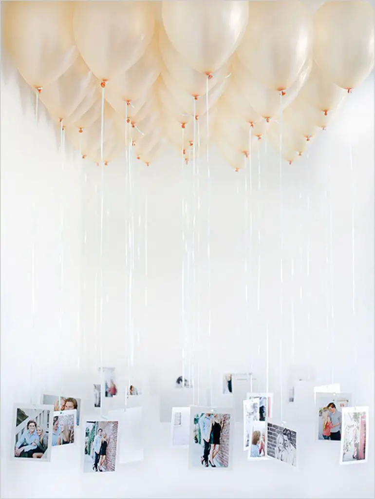 decoración con globos y fotografías